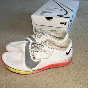 Nike White and Orange jumping spikes